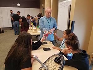 Middle School students at University of New Mexico engaged in 2018 Student Researcher Project Development Bootcamp with program partners at Explora Science Center