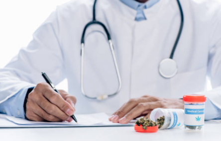 Photo of a healthcare professional writing a note.
