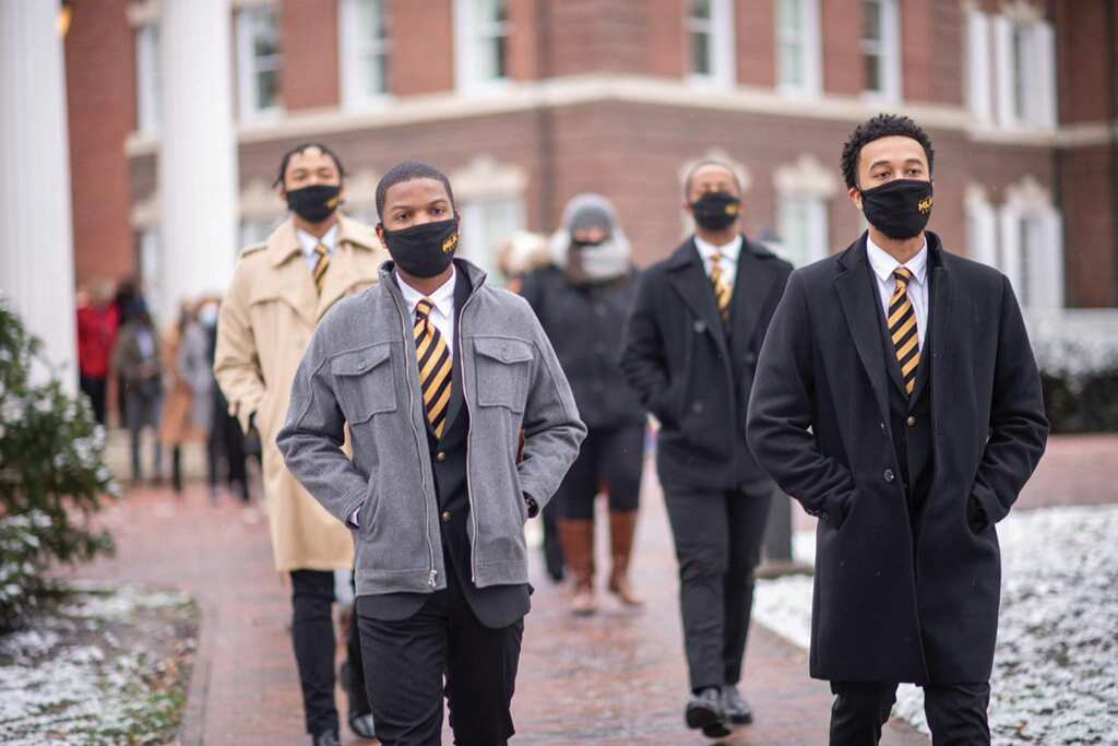 Photo of students and faculty at Ohio University walking on campus during Martin Luther King Jr. Day celebrations.