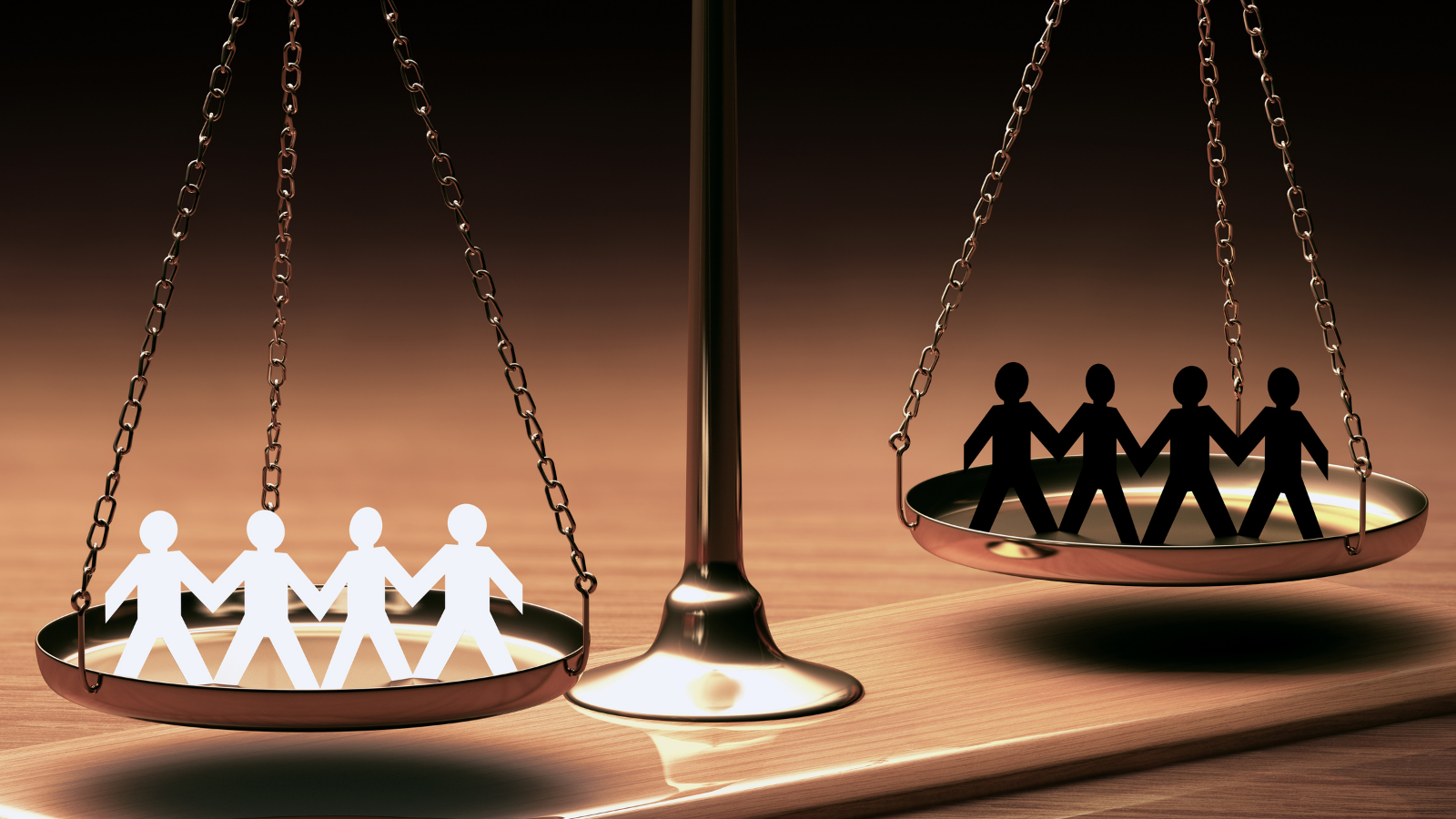 Photo of a scale depicting White stick figures on one side and Black stick figures on the other side.