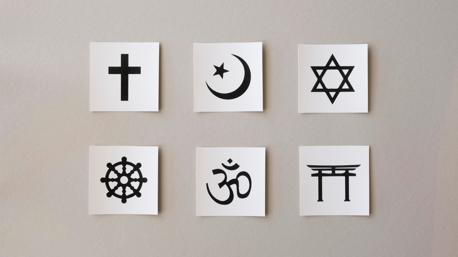 Photo of six different religious symbols, including a cross and Star of David