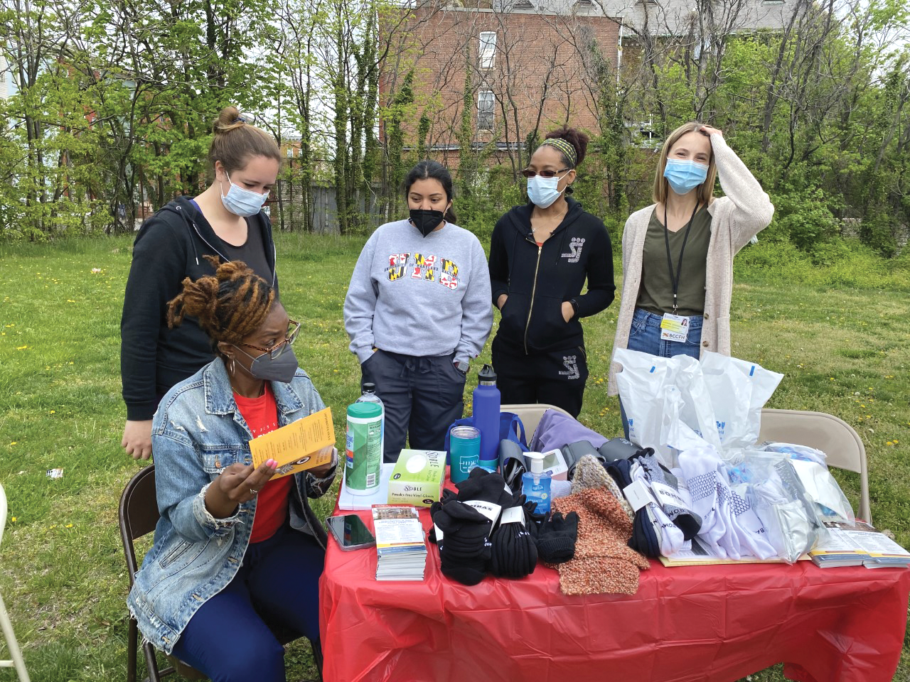 Students at the University of Maryland, Baltimore School of Nursing participate in a health outreach event on campus.