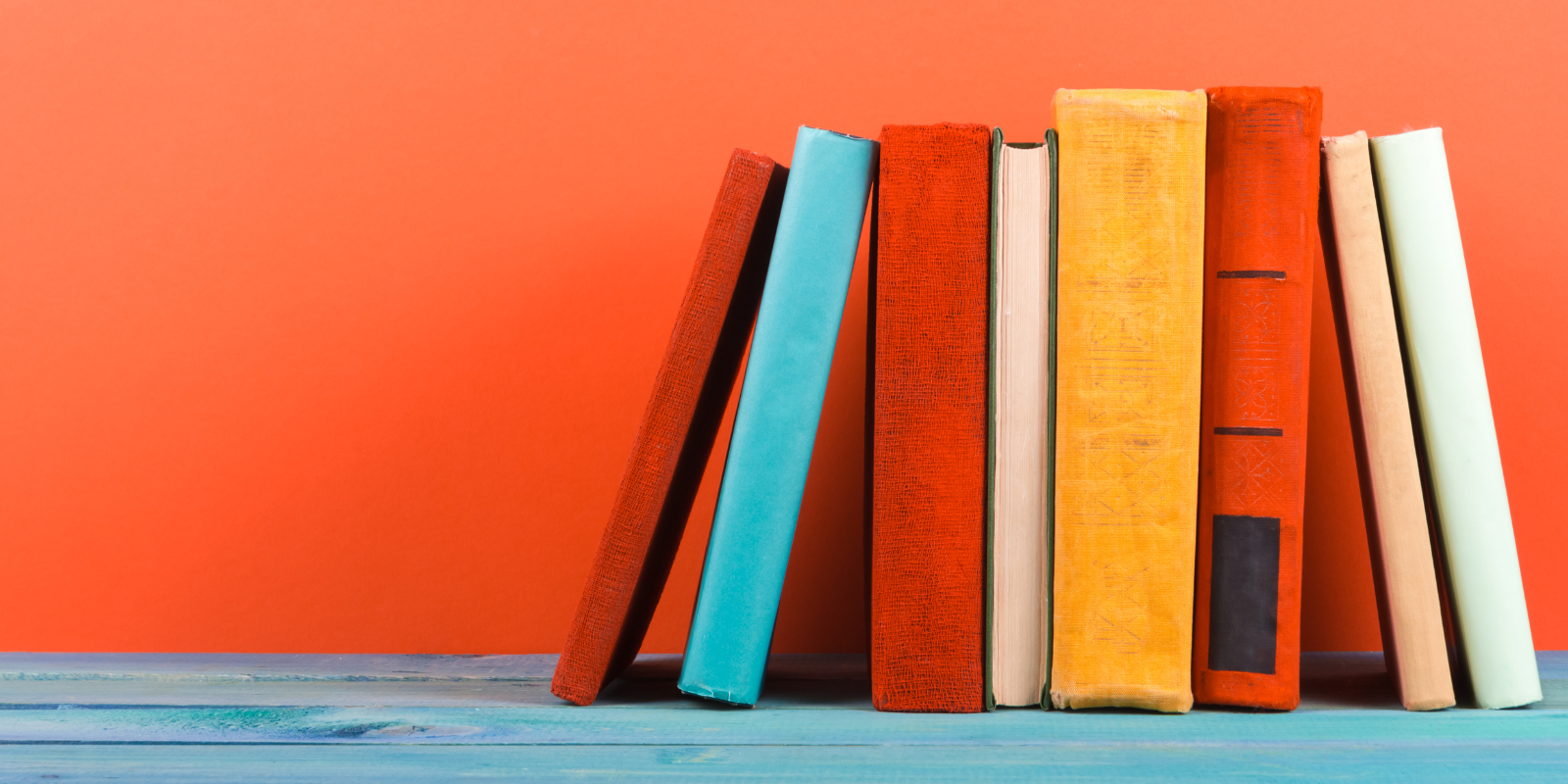 Several books stacked in a row