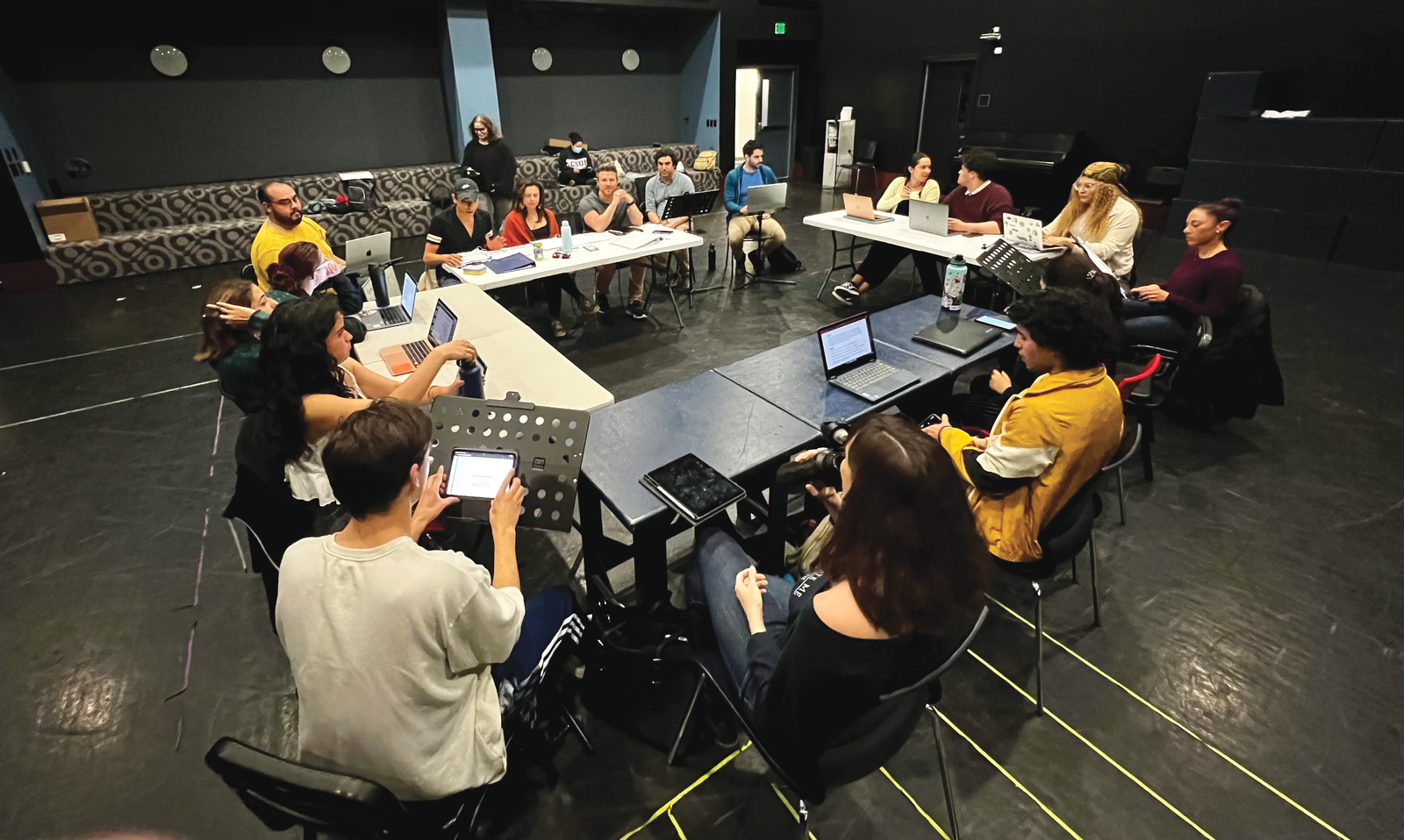 Students and theater professionals at California State University, Fullerton participate in the first reading of the new musical “The Boys and the Nuns.”