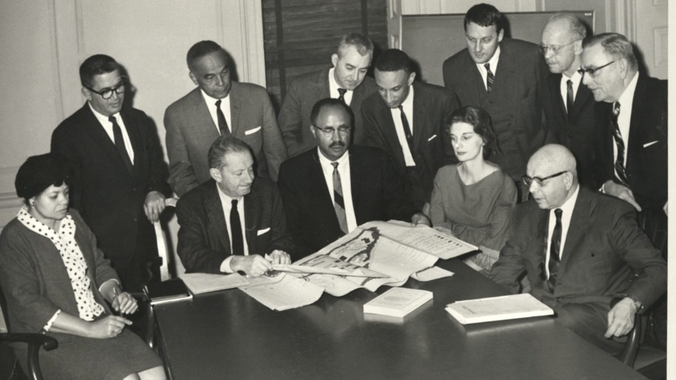 In this Civil Rights-era photo, faculty and administrators from Brown University and Tougaloo College, a Mississippi HBCU, discuss the Brown-Tougaloo partnership. (Photo courtesy Brown University)
